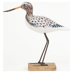 Sandpiper bird on a stand